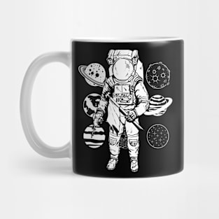 Astronaut wandering between planets Mug